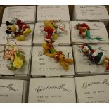 A collection of Disney Christmas Magic Christmas tree decorations to include Mickey, Bambie, Donald,