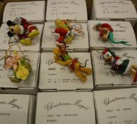 A collection of Disney Christmas Magic Christmas tree decorations to include Mickey, Bambie, Donald,