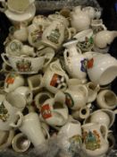 A small crate of various crested wares and another of Japanese coffee set and various lidded boxes