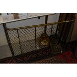 A Victorian brass and wire work nursery spark guard,