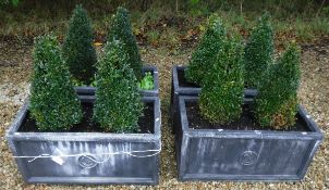 A set of four composite rectangular garden planters, each set with Burford Garden Company logo and