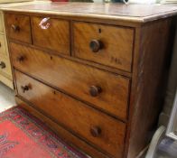 A Victorian mahogany chest of drawers, the plain top above three short drawers above two long