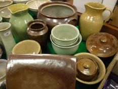 A collection of English stoneware pottery to include a salt-glazed foot warmer, crock, two jugs,