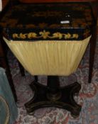 A Victorian ebonised work box with gilt decoration, the top opening to reveal a fitted interior
