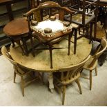 A painted pine circular kitchen table, a set of five beech slat back chairs in the Victorian