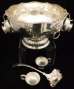 A silver plated twin handled punch bowl with floral swag decoration and lion head masks, together