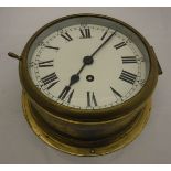 A brass cased ship's style wall clock with Arabic and Roman numerals, together with a 19th Century