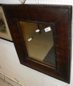 A rectangular wall mirror with oyster walnut veneered frame CONDITION REPORTS