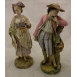 A pair of late 19th Century Vion & Baury polychrome decorated bisque figures of a lady and