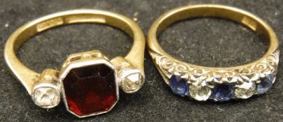 Two 18 carat gold diamond and stone set dress rings