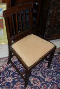 A set of eight 19th Century mahogany bar back dining chairs with reeded decoration, raised on square