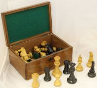 A turned boxwood and ebony chess set CONDITION REPORTS One white pawn is missing and