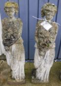 A pair of composite stone figures of maidens holding vases CONDITION REPORTS Each