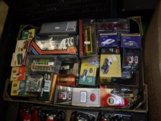 Two boxes of various model cars, buses etc including Burago, Atlas Editions,
