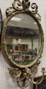 A 19th Century twin branch girandole mirror in a moulded gesso frame CONDITION REPORTS