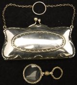 A circa 1900 silver plated evening bag, together with a magnifying glass with silver plated mounts
