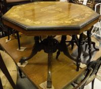 A walnut and inlaid octagonal centre table,