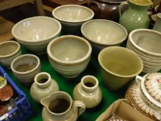 A collection of eleven pieces of 1930's Dearston stoneware pottery including six various bowls, four
