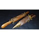 Two Far Eastern brass mounted teak carving sets