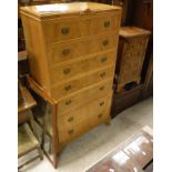 A mid 20th Century walnut chest of seven long drawers on cabriole legs to pad feet and a modern