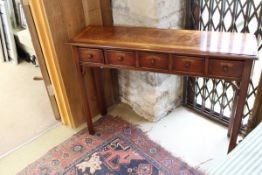 A burr oak and cross banded five drawer spice hall table, the drawers labelled "Rosehip", "