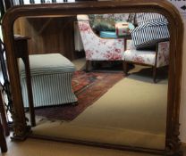 An overmantle mirror in gilt effect frame CONDITION REPORTS Probably a late 19th