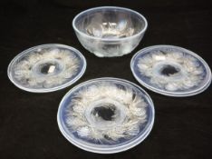 An early 20th Century opalescent glass dessert service comprising bowl and six plates bearing