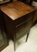 A 19th Century mahogany washstand with double rising lid over a cupboard door