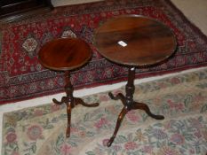 WITHDRAWN - A 19th Century mahogany dish top wine table on turned column support to three