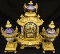 A 19th Century French gilt brass and porcelain cased clock garniture,