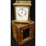 A circa 1900 French lacquered brass cased carriage clock, the enamelled dial with Roman numerals and