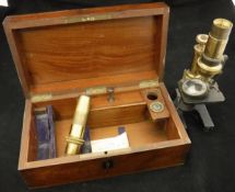 A Victorian mahogany cased lacquered brass minocular microscope by J M Bryson of Edinburgh in