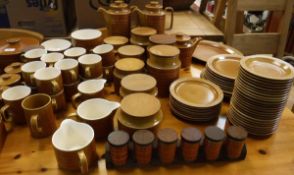 A large collection of 1970's Hornsea "Saffron" dinner and tea wares including plates, various