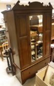 A late Victorian mahogany single mirror door wardrobe and matching dressing chest