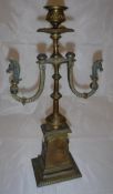 A circa 1900 French candlestick in the Empire taste with Egypto classical style decoration