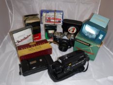 A box of various camera equipment to include a King Penguin camera, slide viewer,