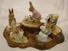 A collection of Beswick Beatrix Potter figures including Little Pig Robinson Spying 1987, Tailor