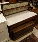A Victorian walnut tile back marble top wash stand,