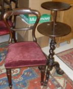 A pair of Victorian mahogany balloon backed chairs on turned front supports,