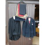 A gentleman's tail coat suit comprising jacket, waistcoat and trousers, a pair of dinner trousers,