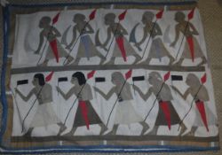 An early 20th Century wall hanging depicting an Egyptian warrior on chariot and various other