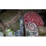 Two boxes of assorted bed throws, tablecloths,