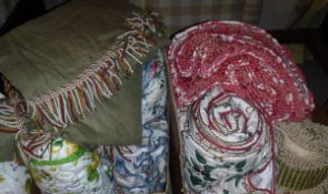 Two boxes of assorted bed throws, tablecloths,