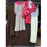 A collection of vintage ladies clothing to include a Catherine Buckley of London orange net top and