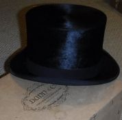 A black silk top hat,