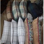 Two boxes of assorted scatter cushions and throws/blankets to include Highgrove tartan cushions,