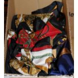 A box containing seven various silk scarves to include Hermes, Chanel, Versace,