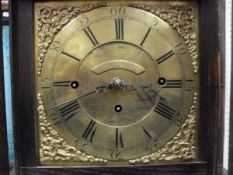 A carved oak cased long case clock,