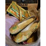 A pair of vintage 1970's Kurt Geiger shoes of green, orange and yellow floral design,