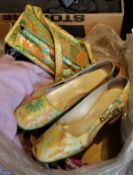 A pair of vintage 1970's Kurt Geiger shoes of green, orange and yellow floral design,